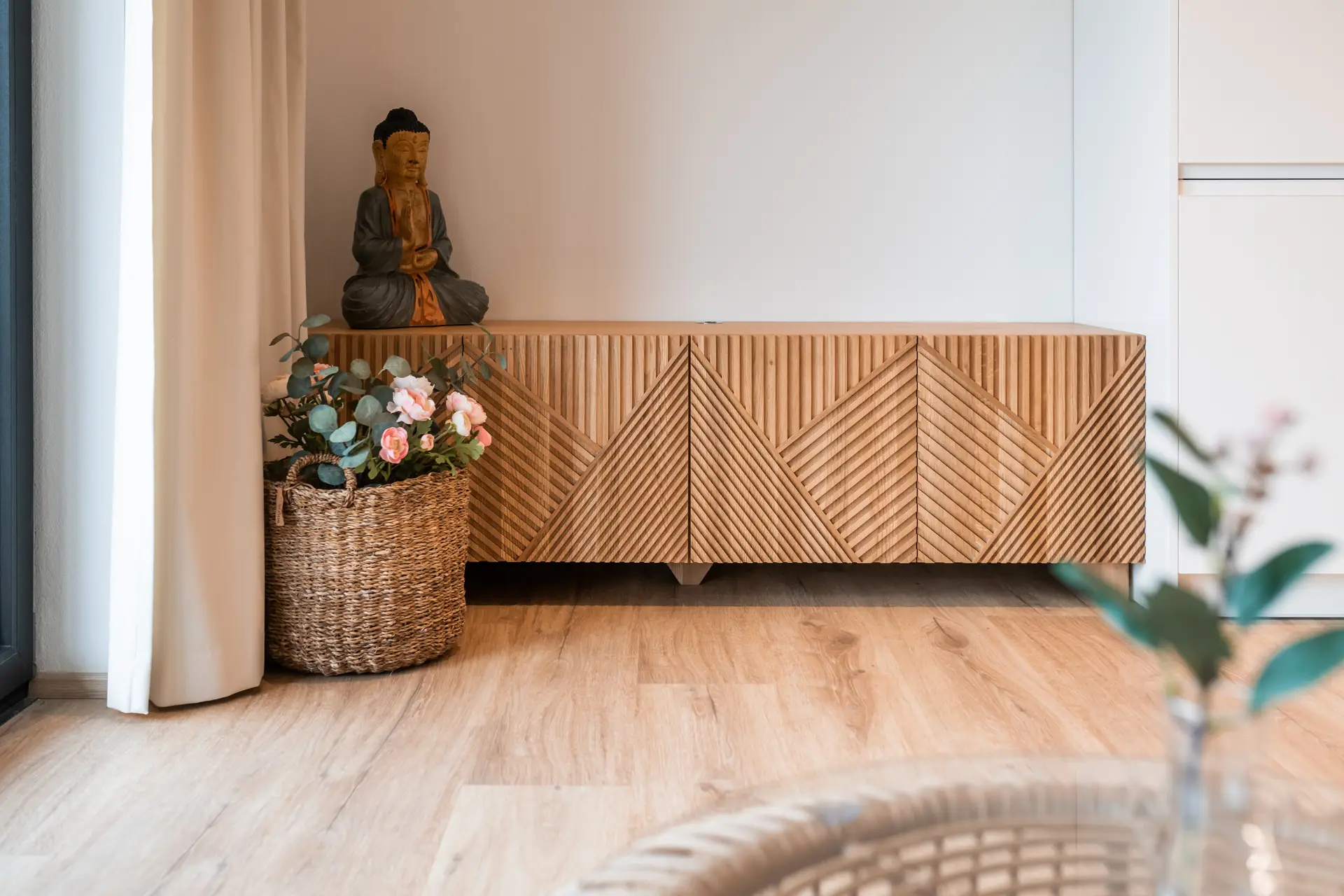Sideboard with a sculpted diagonal pattern and styling