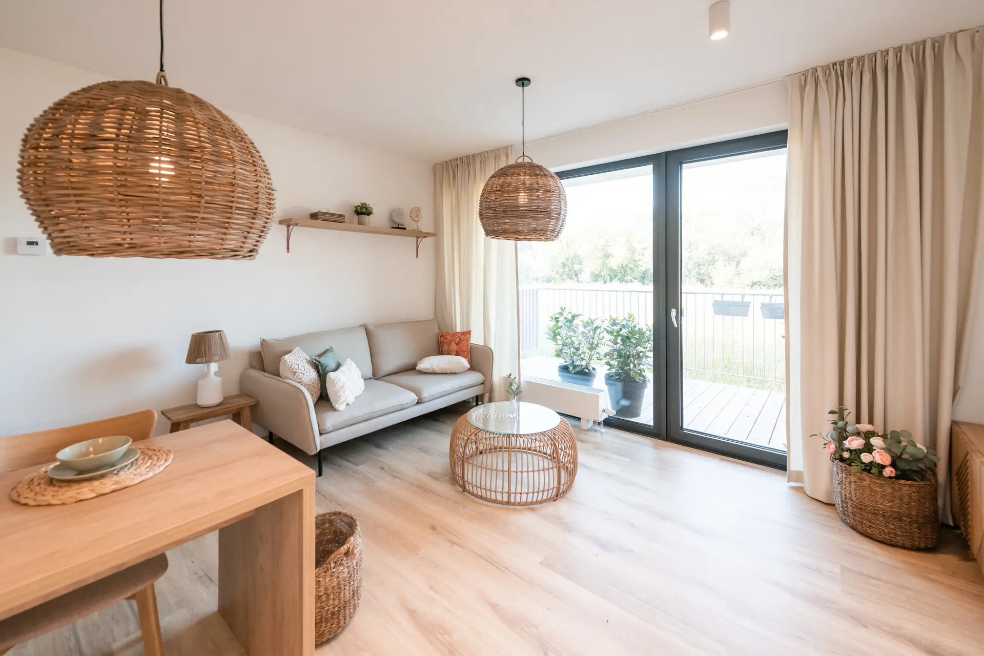 Open layout of kitchen, dining and living room