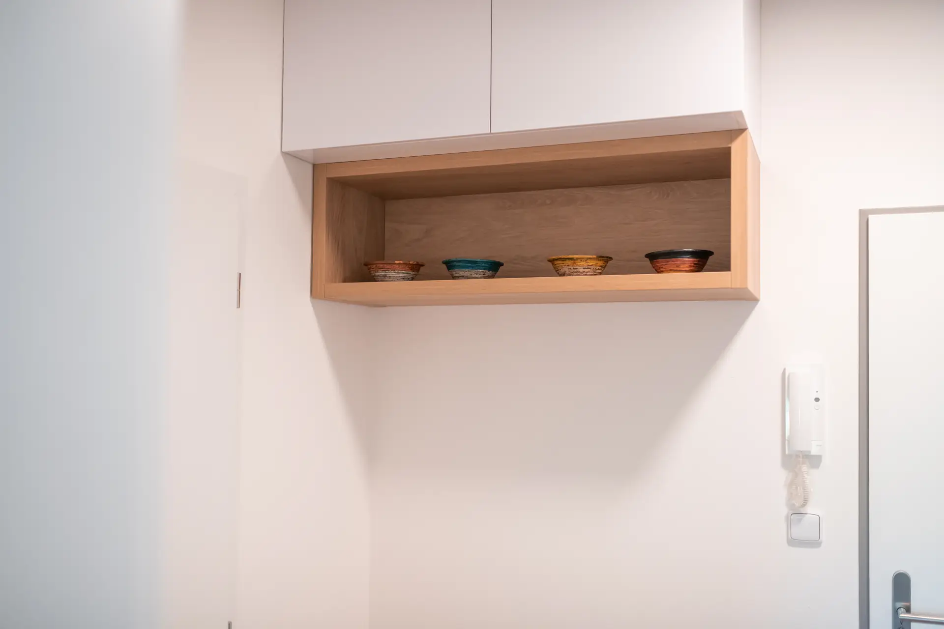 A built-in shelf as a quiet detail