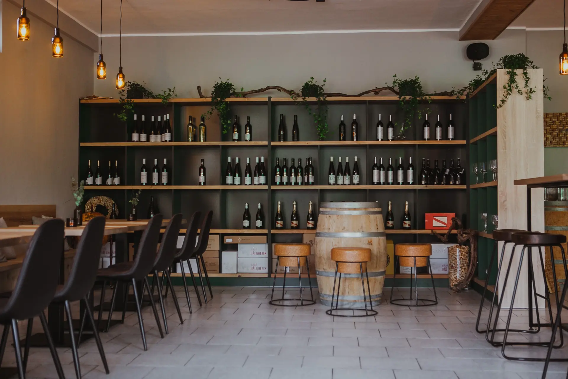 The bar and back-bar with wine bottles