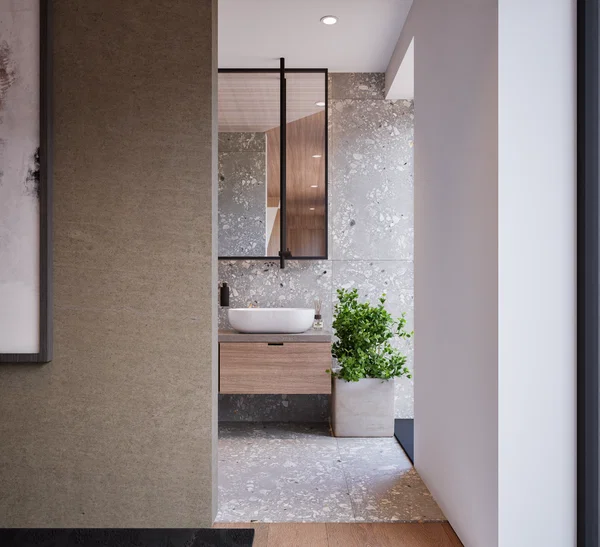 Bedroom with upholstered headboard and indirect lighting